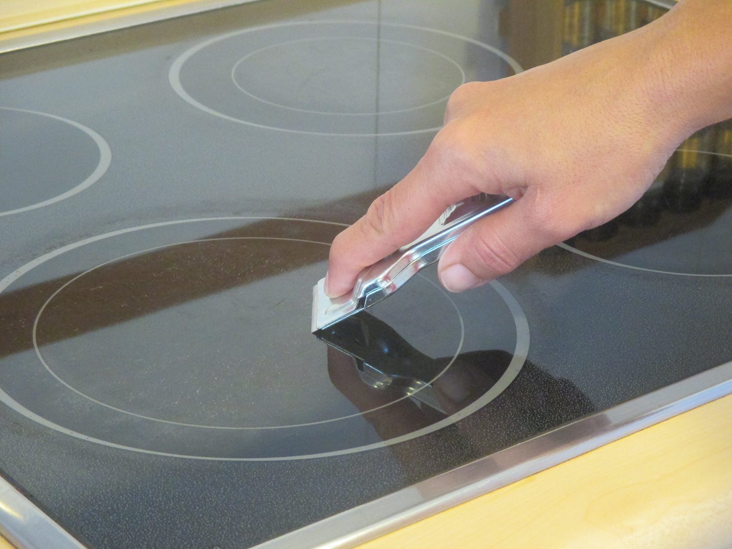 Inductie kookplaat schraper